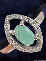 Front view showing emerald and CZ halo