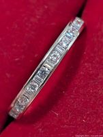 Channel-set CZ stones on silver band