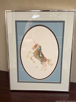 Front view of framed unicorn print showing overall appearance