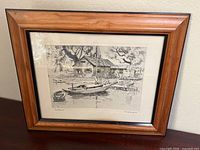 Full view of framed sketch showing frame and art