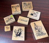 All eight wood-mounted rubber stamps displayed