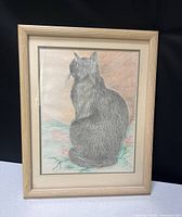 Full view of framed cat drawing