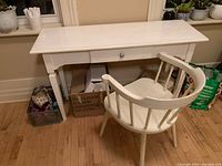 Desk front with drawer and chair positioned