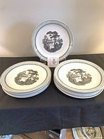 Stacked and upright view of all 14 plates