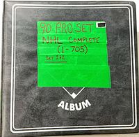 Front of black Pro Set album binder labeled 90 Pro Set NHL Complete (1-705)