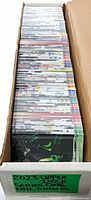 Long cardboard box filled with upright hockey trading cards
