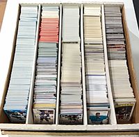Top view of five-row cardboard box filled with hockey cards