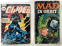 Front covers of both items showing titles, artwork and wear