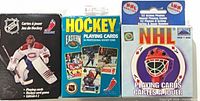 Front view of all three NHL hockey playing card decks