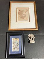 Group shot showing framed sketch, framed photo, metal Nataraja