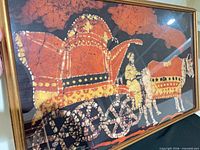 Front view showing full framed batik painting with chariot scene