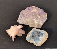 All three crystal specimens: purple fluorite, pink quartz cluster, blue celestite geode