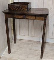 Desk with drawer and storage box on top