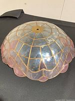 Top view of stained glass shade showing overall design and colors