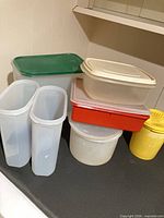 group of Tupperware containers stacked