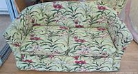 Front view of floral loveseat