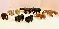 Group shot of all ten animal figurines in two rows