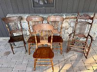 group shot of all five wooden chairs
