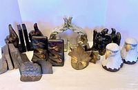 Group shot of all fourteen bookends showing each design