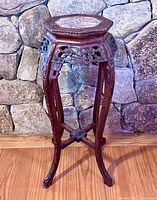 Full view of rosewood plant stand showing overall design and condition