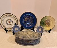 Group shot of all six items on stands and table