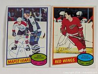 Front view of both autographed O-Pee-Chee cards