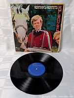 Front album cover and vinyl record visible