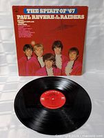 Front jacket with record displayed