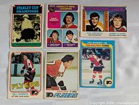 All six hockey cards laid out for overview