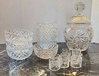 Entire lot showing jar, bowls stacked, napkin rings