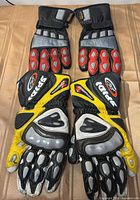 Both glove pairs laid out front view