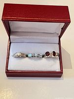 All three sterling silver rings in box