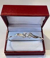 Bangle in display box showing CZ front detail