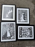 Group shot of four framed etchings
