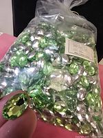 Full unopened bag with mixed green and silver-back stones