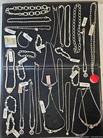 Full tray showing all tagged Ann Taylor silver-tone jewellery pieces