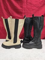 Front view of beige and black chunky sole boots