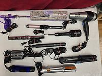 Overview of all Conair hair styling tools laid out on table