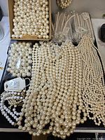 overview of loose beads and many strands laid out