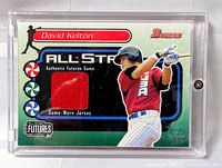 Front of card showing player image, swatch, and branding