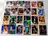 Overview of all 24 basketball cards laid out in four rows