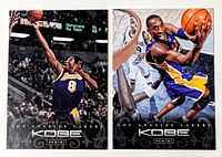 Both Kobe Bryant Panini cards side by side