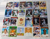All 24 baseball cards laid out in four rows