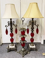 Front view showing both lamps and pedestal ashtray