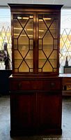 Full front view of mahogany secretaire bookcase cabinet