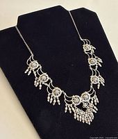 Full view of necklace on display bust