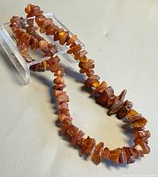 Full view of amber chunk necklace