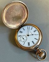 Watch open showing dial and size