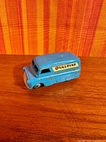 Left side view showing "Ovaltine" decal and overall paint wear