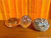 All three paperweights front view